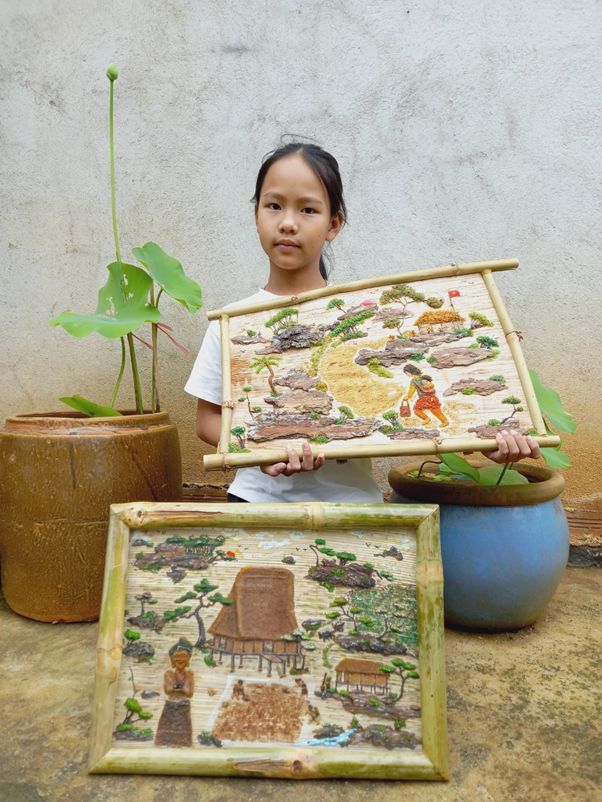 Đề tài: Bức tranh "Chị gái vùng cao vượt khó, cõng em đi học" – Tiểu học Nguyễn Đình Chiểu
